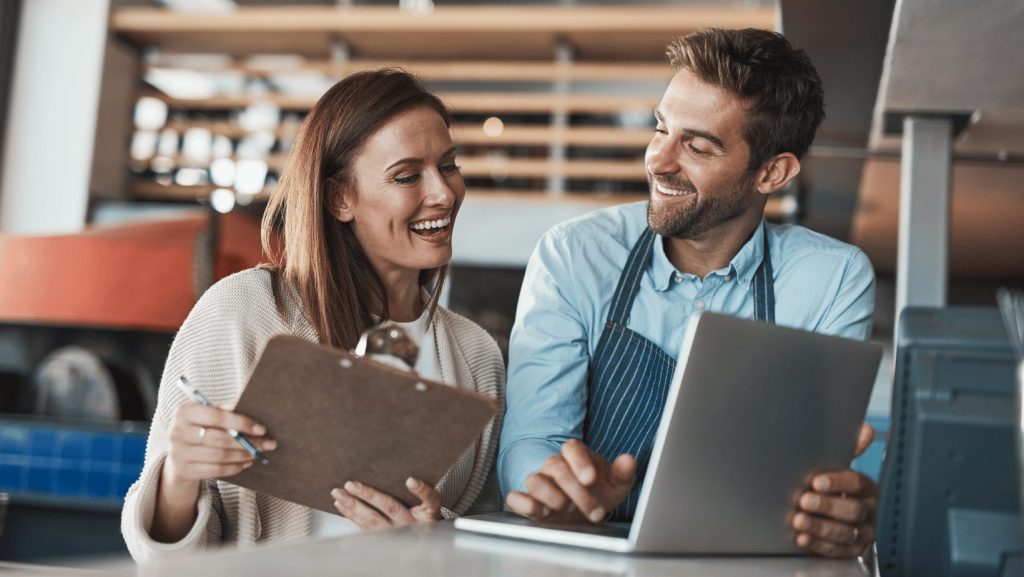 coffee shop owners writing a business plan