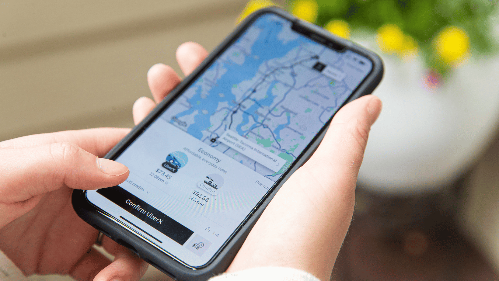 Uber surge pricing on app. 